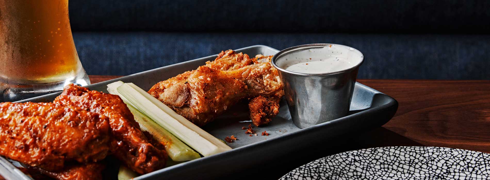 Gazette bistro dish with a beer